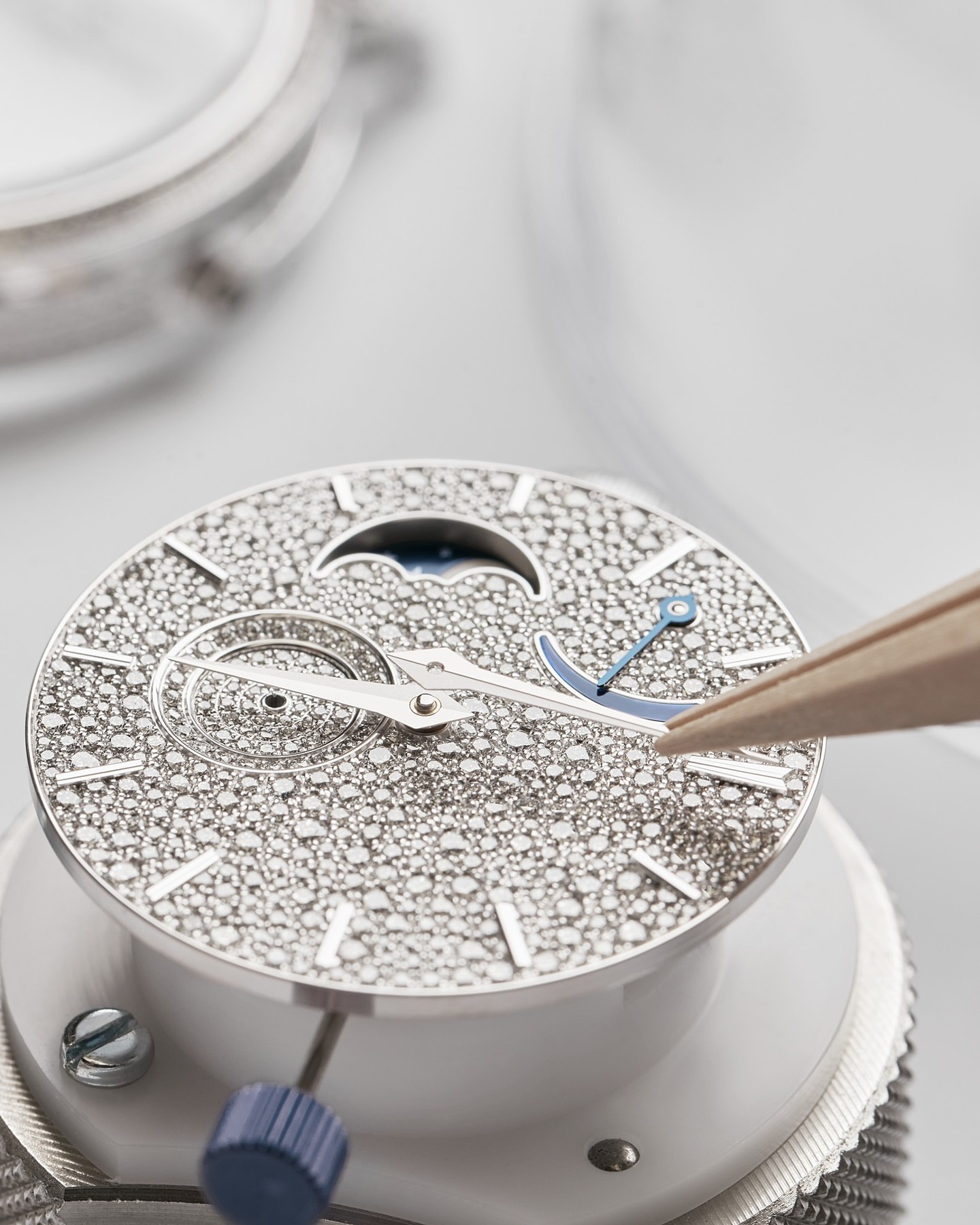 A Dazzling Spectacle

As the year culminates in joyous celebrations, the Vacheron Constantin Traditionnelle moon phase is a timeless example of high jewellery and horological artistry, where every facet sparkles with unparalleled brilliance. Its dial is transformed by a captivating snow setting of 548 meticulously placed round-cut diamonds, creating a seamless, melting-into-light effect. This fine diamond pavé extends across the entire timepiece, with a total of 795 diamonds, approximately 4.8 carats, adorning the bezel, case, lugs, and crown – a true testament to virtuoso gem-setting skills.

Certified by the Hallmark of Geneva, the Traditionnelle moon phase embodies the Maison's unwavering commitment to excellence in both horology and high jewellery, offering a radiant expression of  timeless elegance to celebrate the season.

#VacheronConstantin #TheQuest #VC270