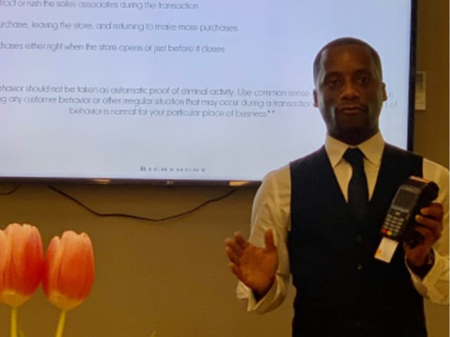 A photo of Leon Brown during a presentation