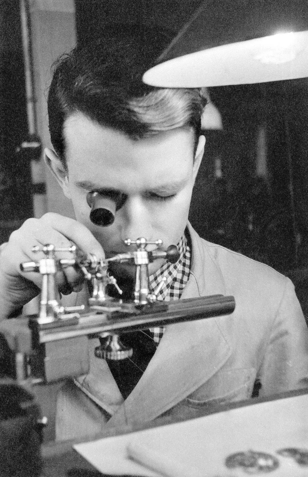 A man assembling a watch