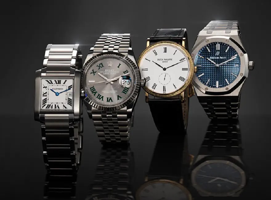 Four watches with different straps