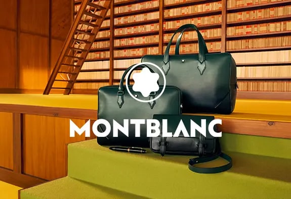 Montblanc logo with black bags in the background